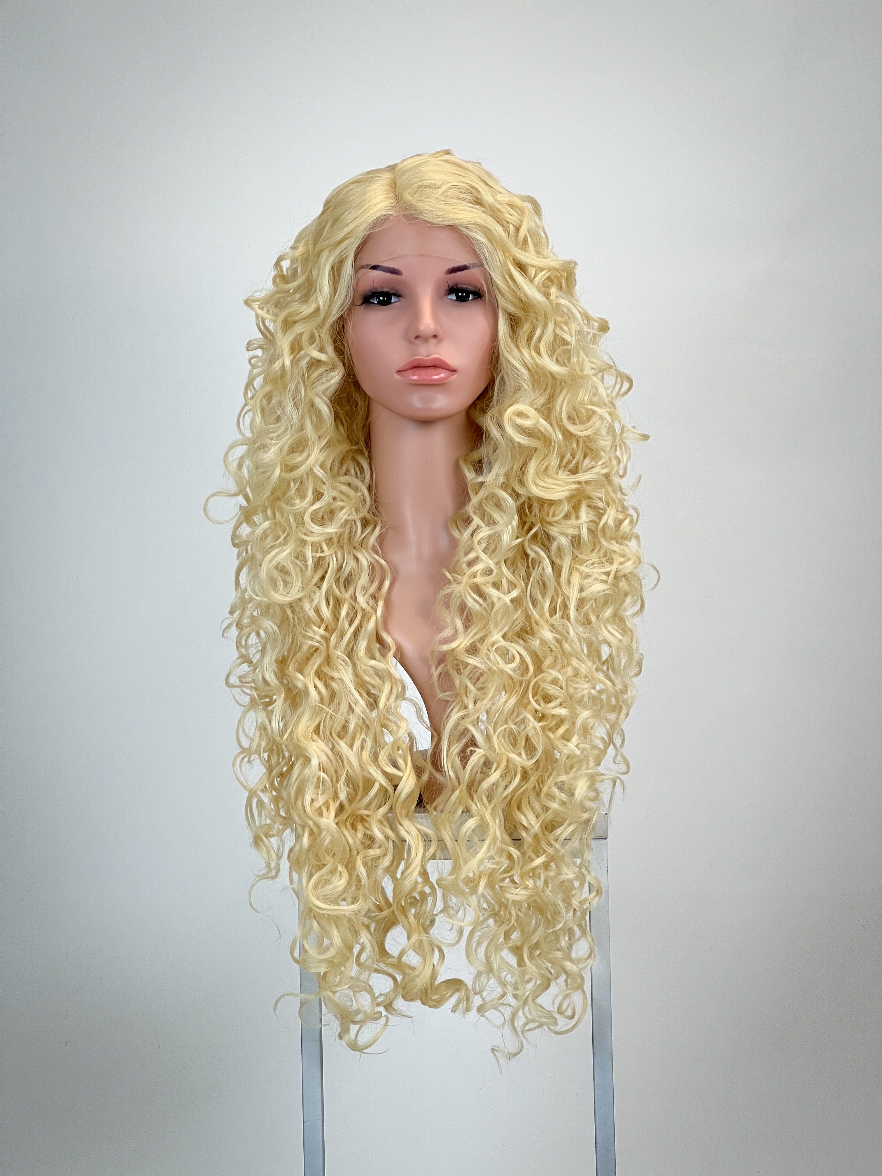 Delilah Bleach Blonde Natural Pose Wigs